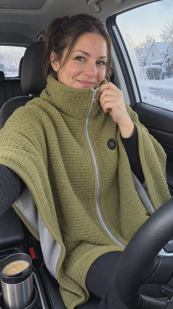 LYVRA Wärmeponcho im Auto